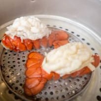 10 Oz Ribeye & 4 Oz Lobster Tail.